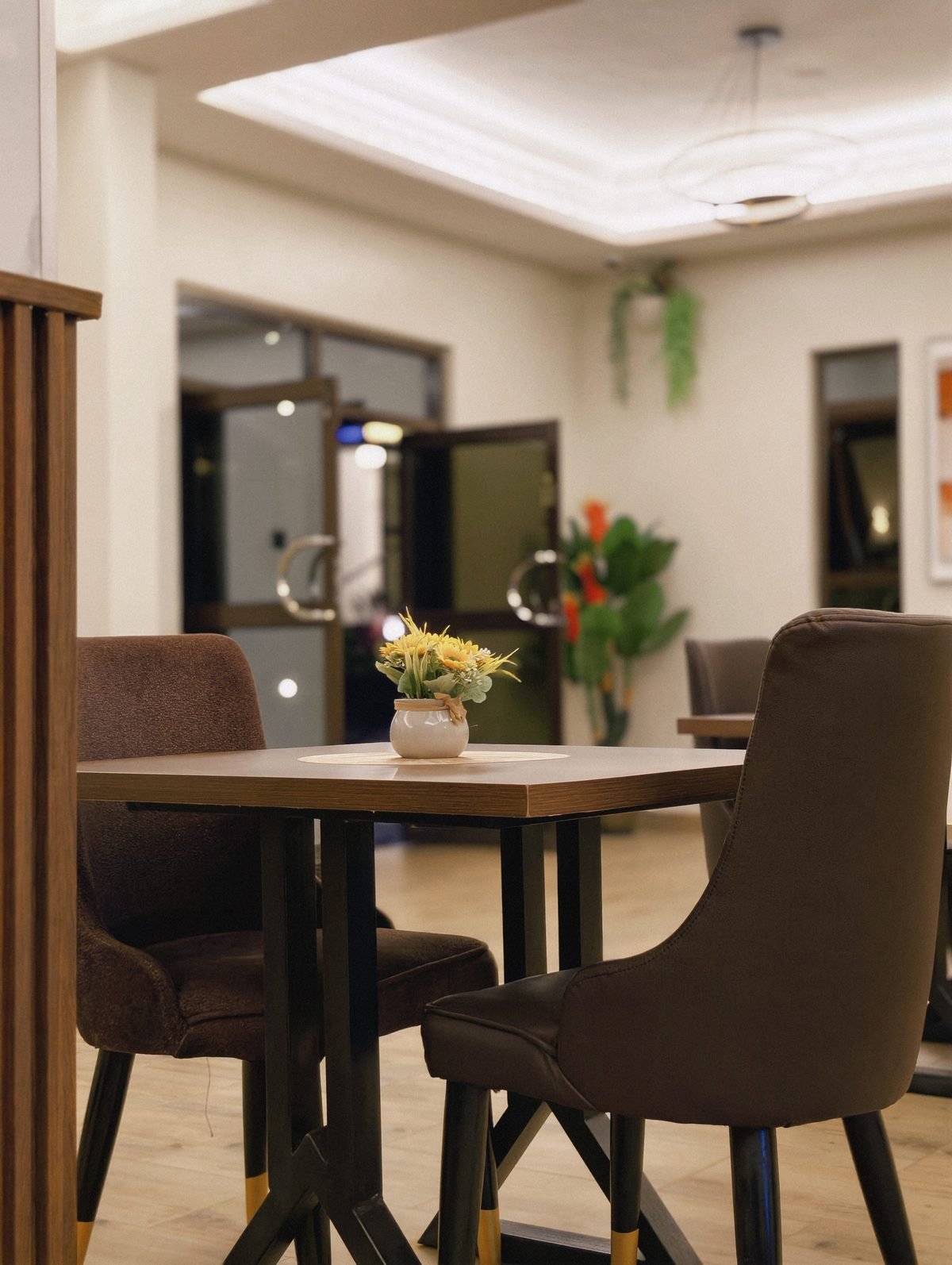 Restaurant tables ready for guests at Bakerm Hotel