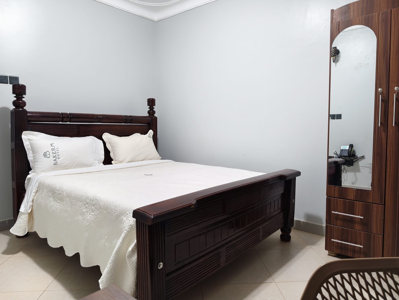 Standard guest room with Bakerm Hotel bedding